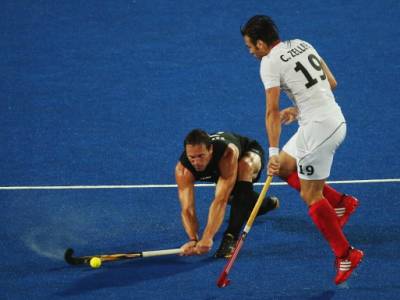 Hockey men draw with Germany