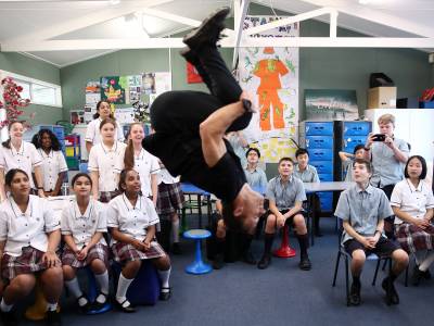 Rio Olympian Dylan Schmidt surprises students on Olympic Day